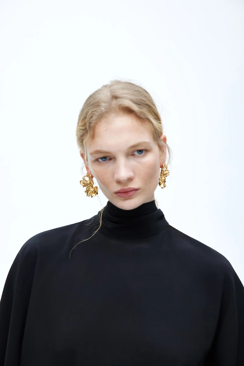 Blouse cape asymétrique