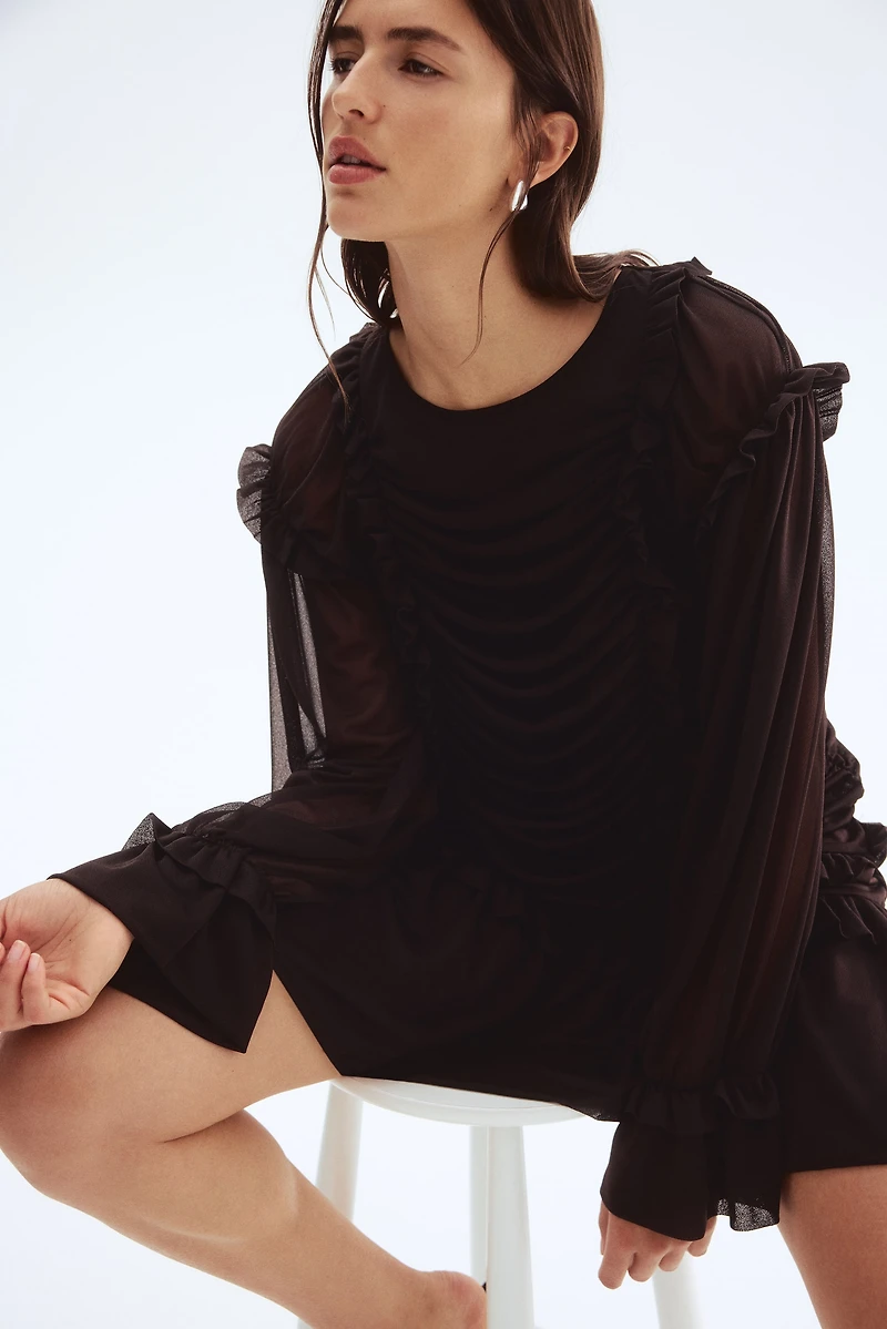 Robe à volants et drapée