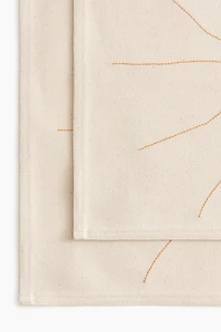 2-pack embroidery-detail place mats