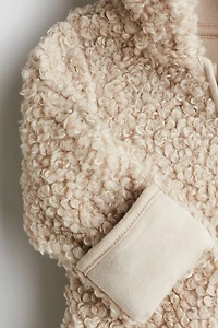 Combinaison à capuche duveteuse