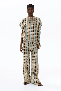 Asymmetric Cape Top