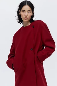 Manteau à écharpe