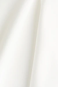 Haut péplum en jersey point de Rome