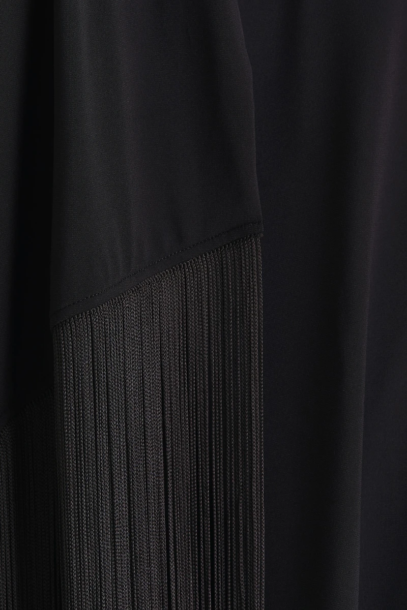 Haut asymétrique avec col écharpe