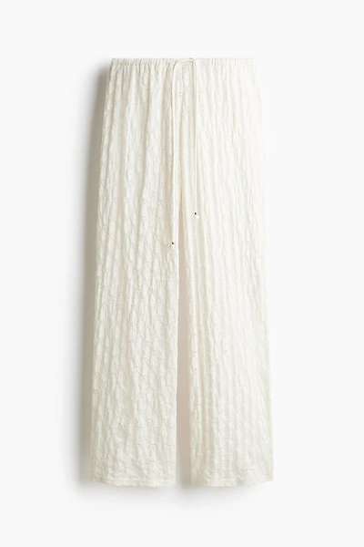 Pantalon façon dentelle avec cordon de serrage
