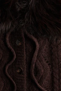 Gilet sans manches en tricot torsadé à col