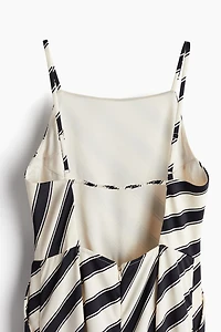 Combi-pantalon avec dos ouvert