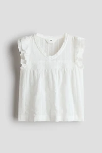 Blouse à manches volantées