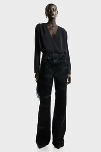 Maillot string drapé à encolure en V