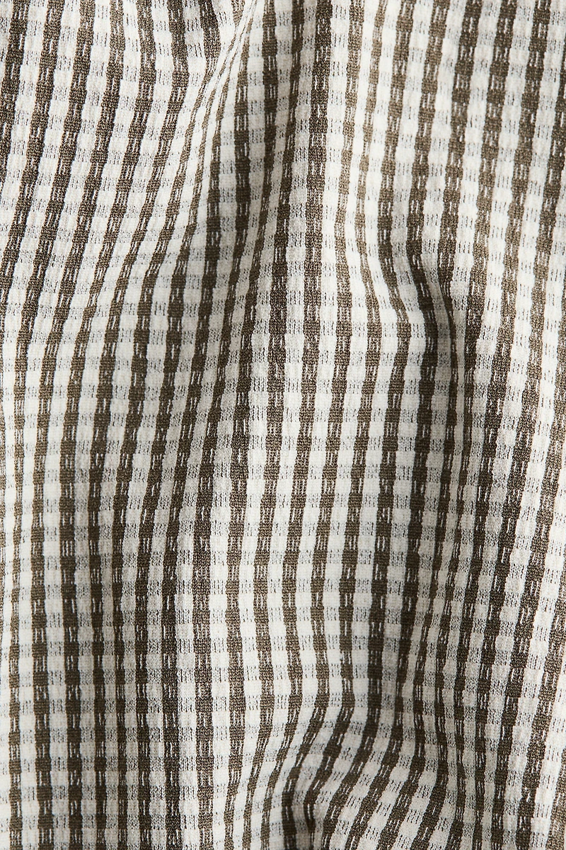 Blouse à manches bouffantes avec liens nouer