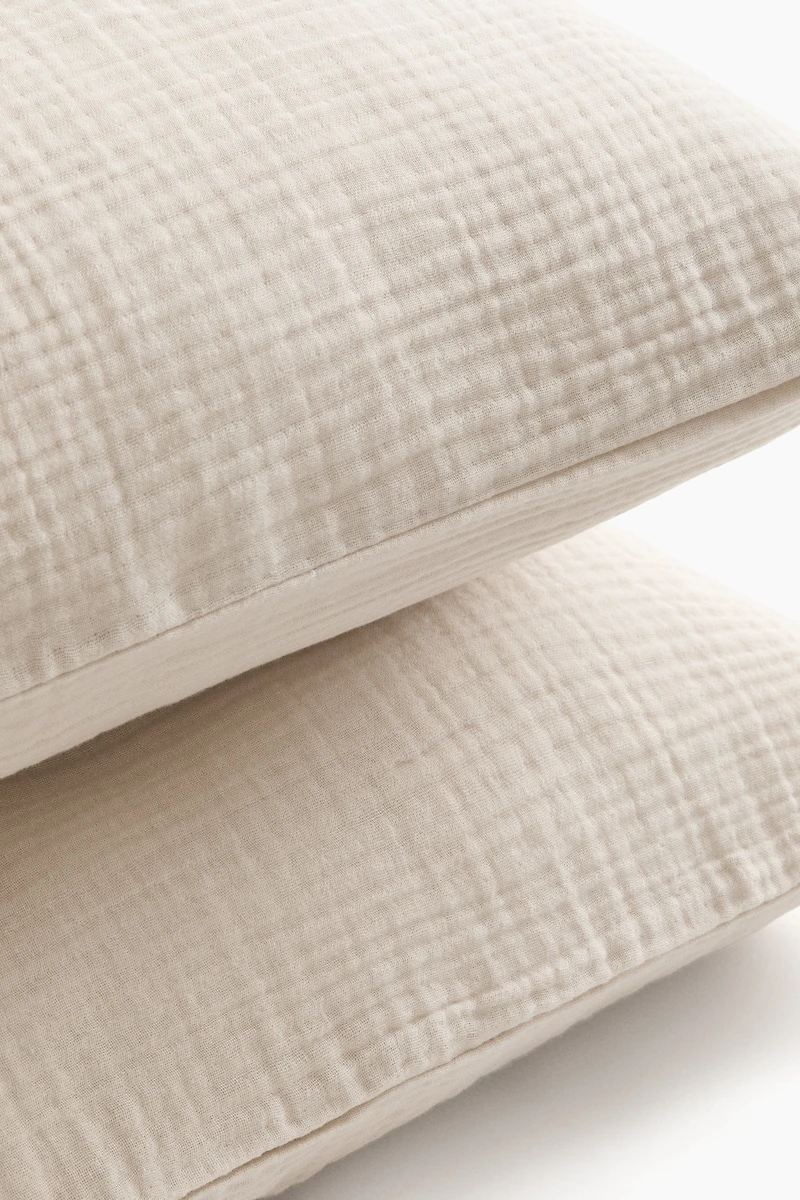 Lot de 2 taies d'oreiller en mousseline coton