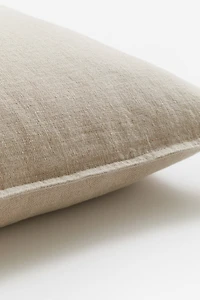 Housse de coussin en lin lavé