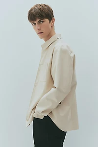Chemise coupe classique en tissu enduit