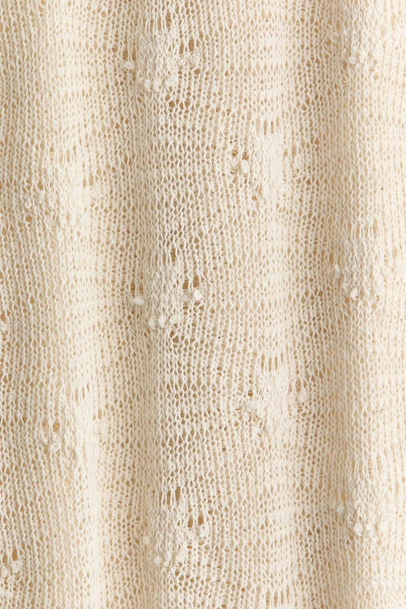 Robe d’aspect crochet avec dos décolleté