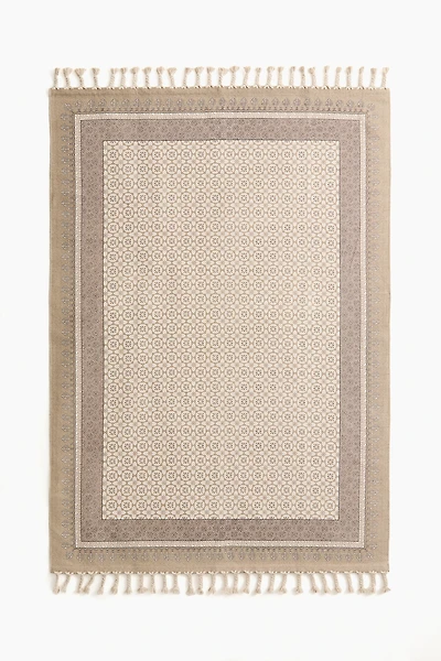 Tapis à motif avec franges