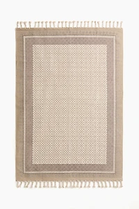Tapis à motif avec franges