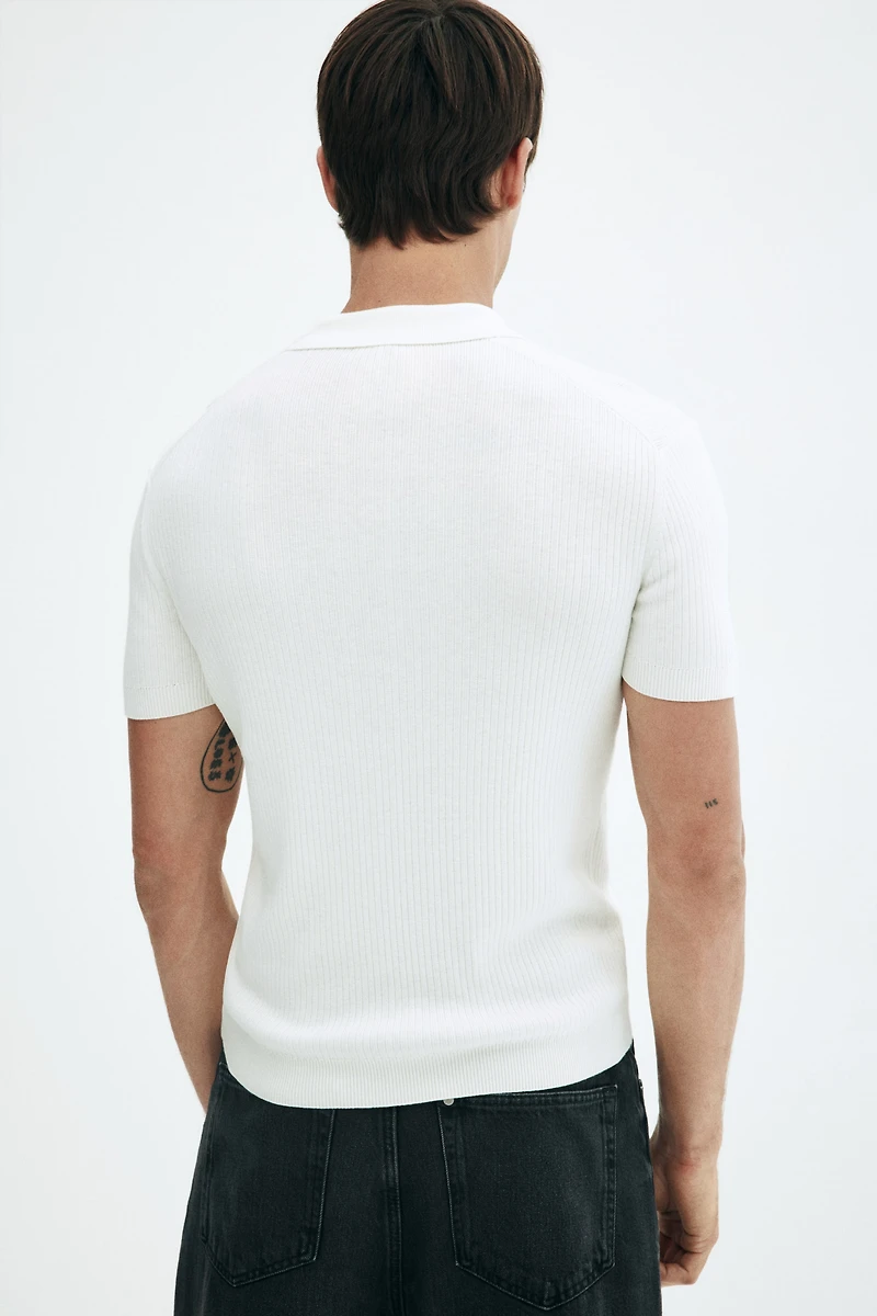 Polo près du corps avec col à fermeture éclair