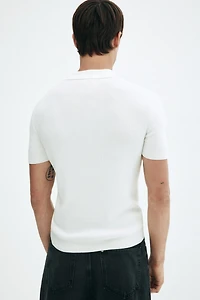 Polo près du corps avec col à fermeture éclair