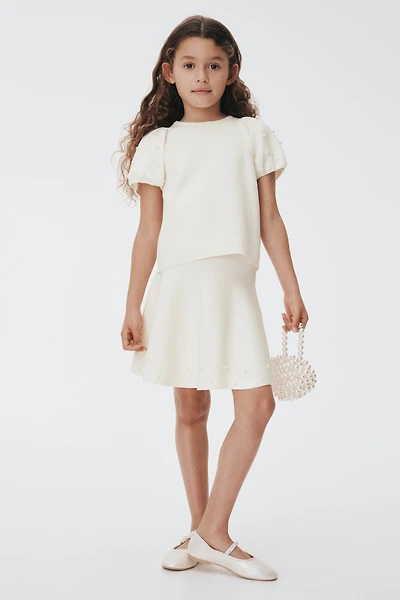 Jupe en tricot fin avec perles fantaisie