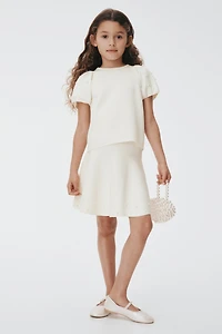 Jupe en tricot fin avec perles fantaisie