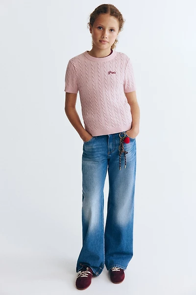 Haut en tricot torsadé