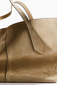 Sac de magasinage en daim