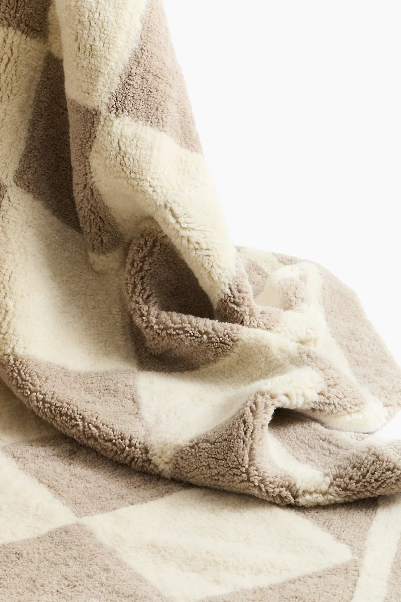 Tapis à motif arlequin en laine mélangée