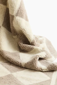 Tapis à motif arlequin en laine mélangée