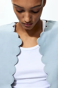 Veste à bords festonnés