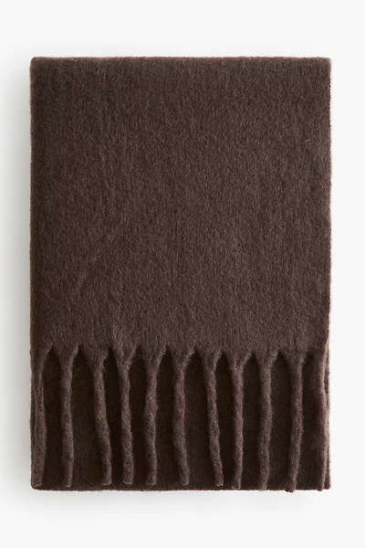 Couverture à franges en laine mélangée