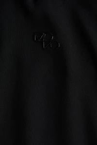 Haut MAMA de sport à manches longues