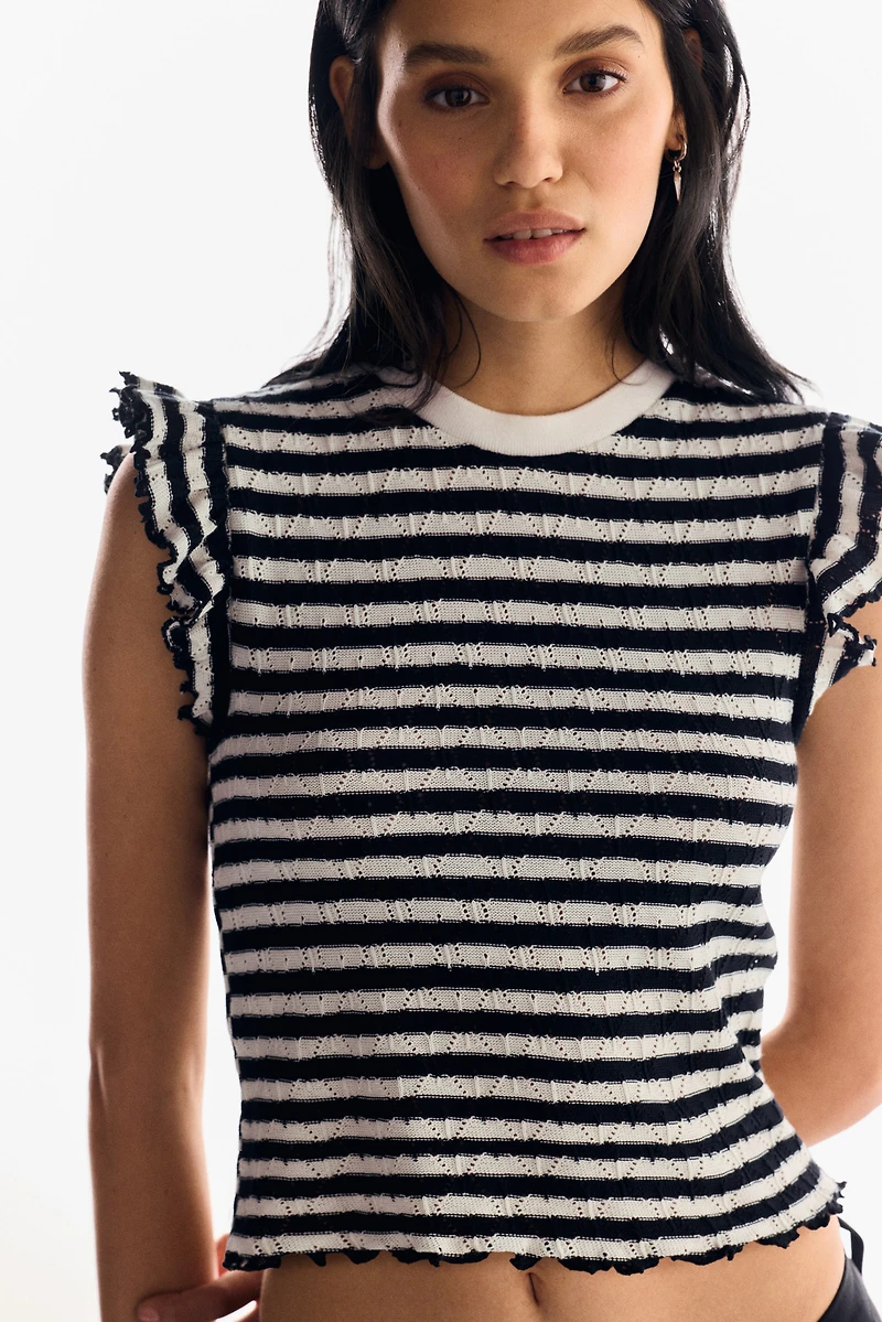 Haut à manches volants