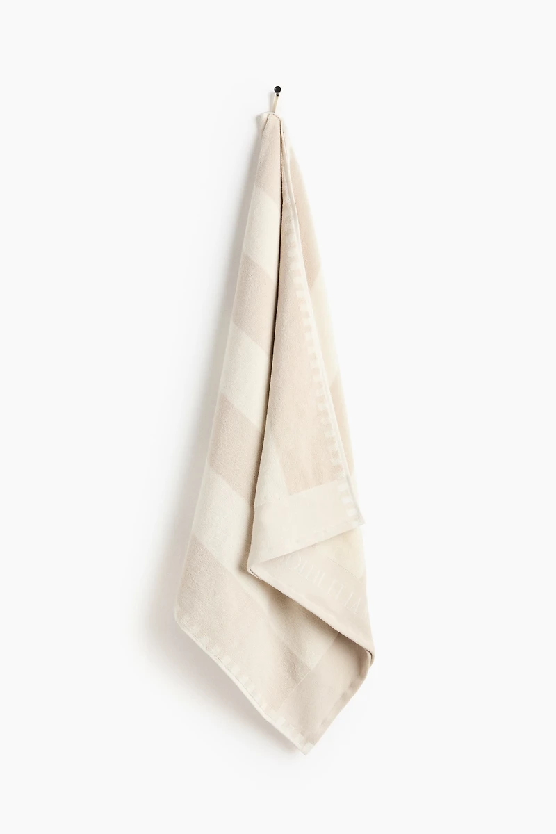 Serviette de plage rayée en coton