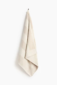 Serviette de plage rayée en coton