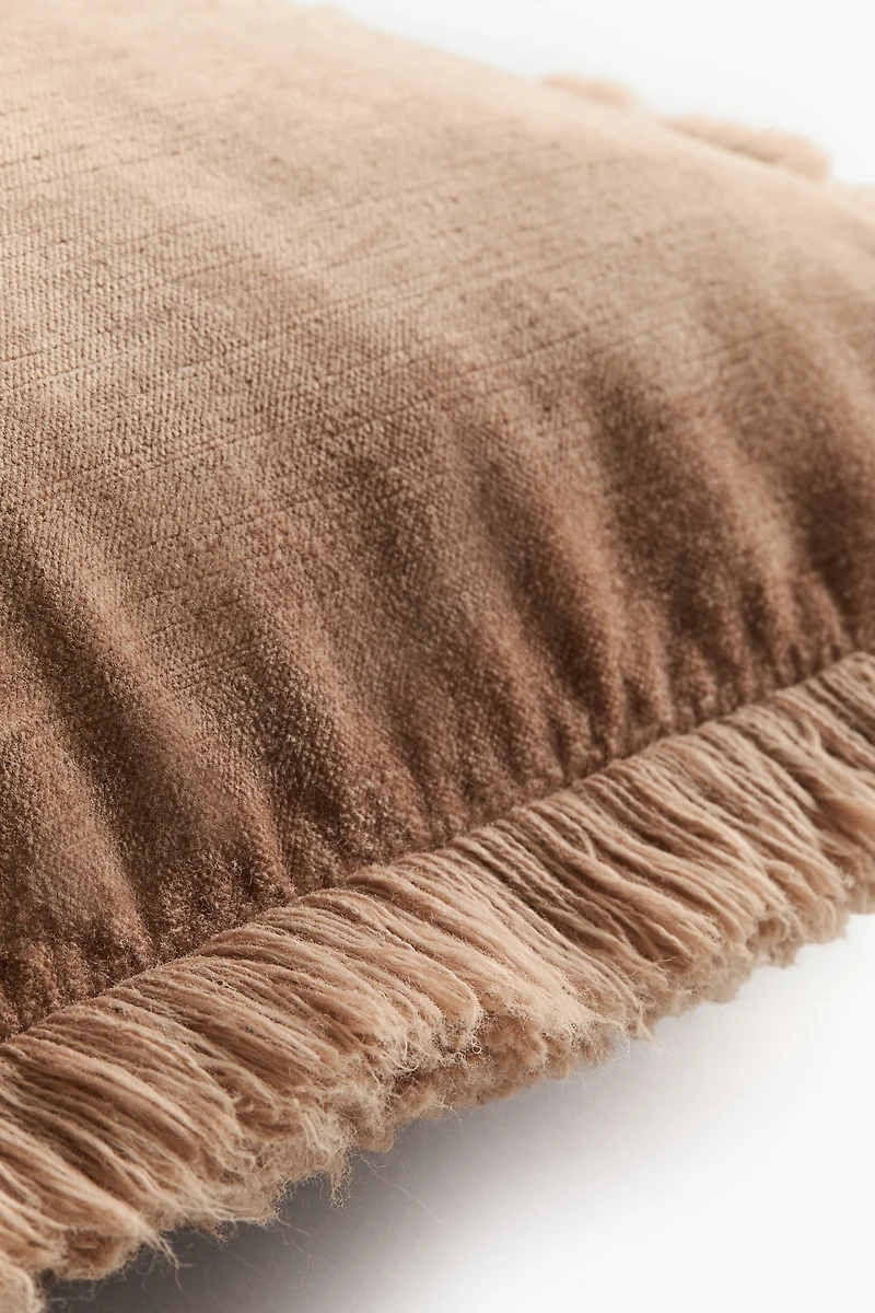 Housse de coussin frangée en velours