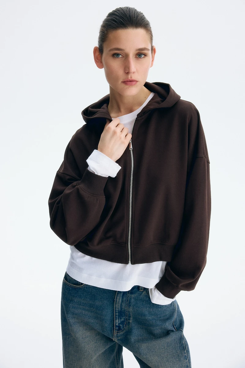 Veste courte à fermeture éclair avec capuche
