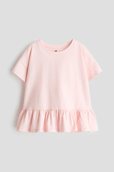 Haut péplum en coton