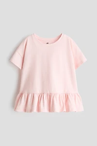 Haut péplum en coton