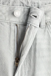 Jean taille haute jambes tonneau