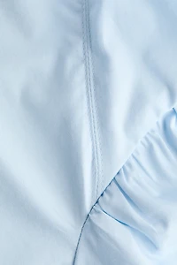 Robe à bretelles fines avec jupe évasée
