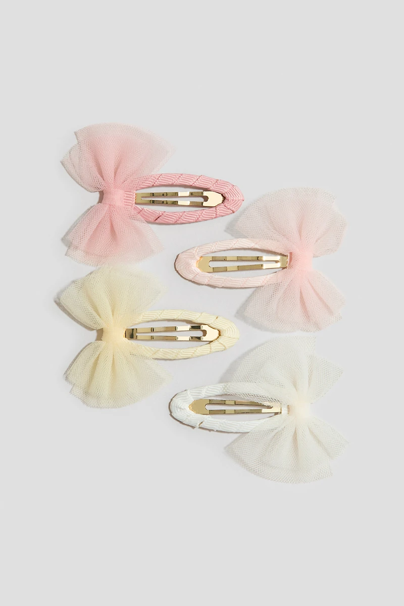 Lot de 4 barrettes avec appliqué