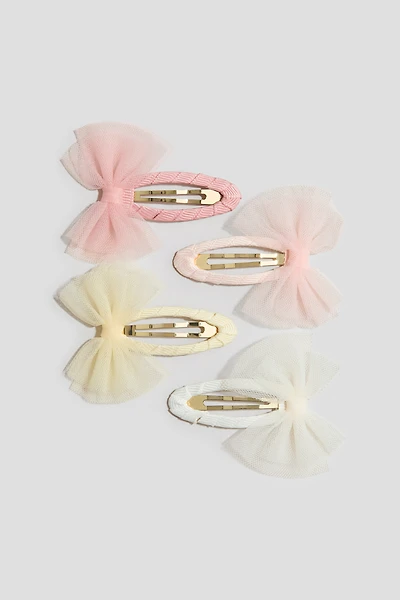 Lot de 4 barrettes avec appliqué