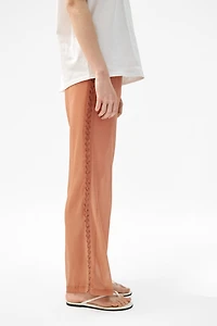 Pantalon à taille élastique avec perles fantaisie