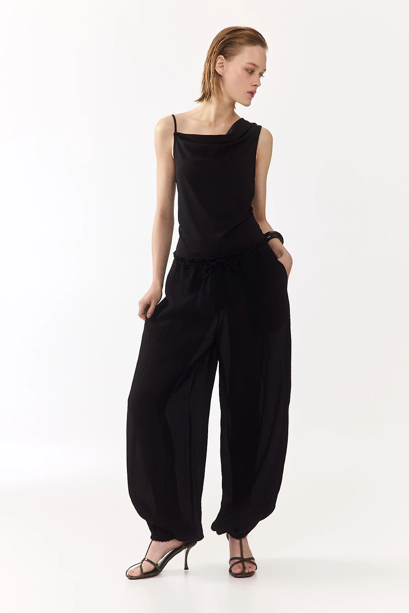 Draped Asymmetric Top