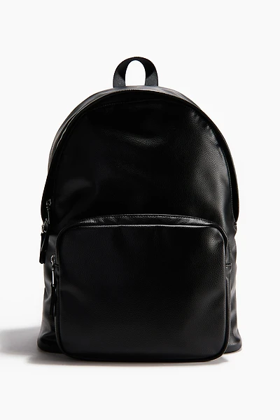 Sac à dos en tissu enduit