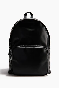 Sac à dos en tissu enduit