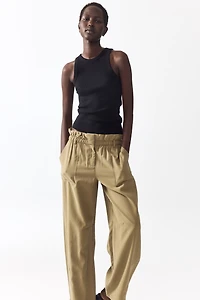 Pantalon taille froncée avec jambes tonneau