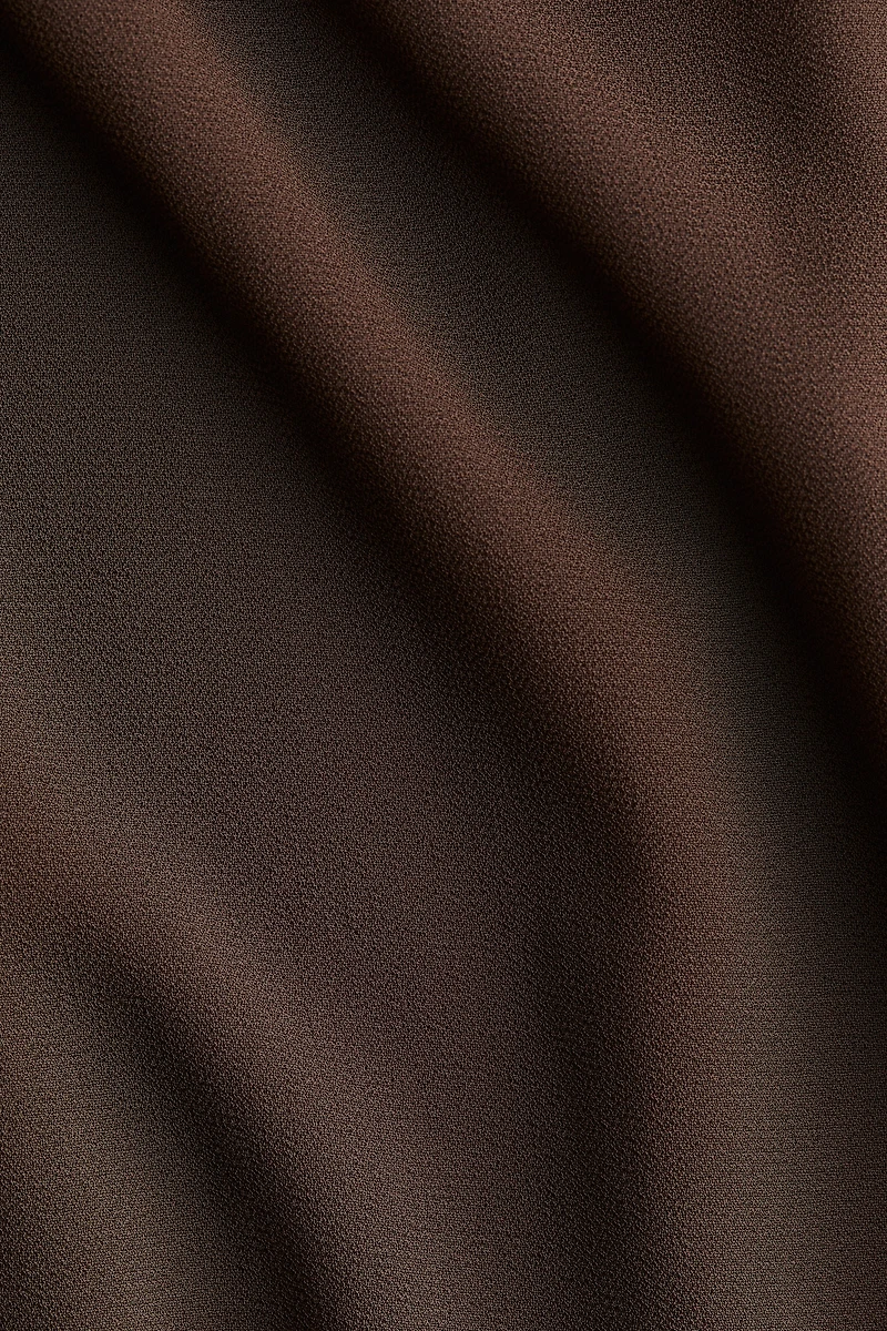 Pantalon en mousseline avec jupe superposée