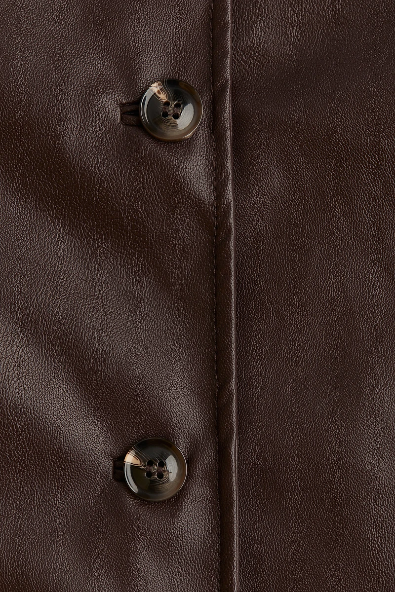 Veste en tissu enduit