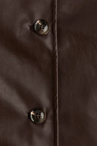 Veste en tissu enduit